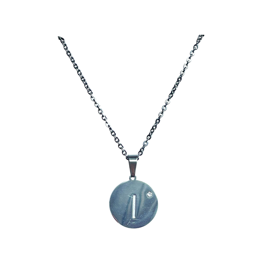 Inicial I con brillo, corazón por detr...